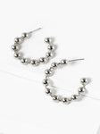 Silver beaded hoop earrings on a white background