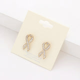 Crystal pink ribbon stud earrings with sparkling rhinestone accents and gold trim on a white background.