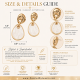Gold geometric drop earrings featuring polished organic gold-tone studs with white marbled resin dangle accents on a beige background.
