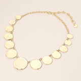 Gold hammered disc link statement necklace with graduated round textured discs and adjustable extender