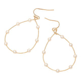 Gold pearl open hoop teardrop dangle earrings with delicate pearl accents and elegant feminine design.