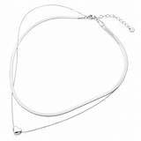 A silver snake chain necklace with a small heart-shaped pendant, displayed on a clean white background.