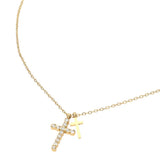 Gold stainless steel double cross pendant necklace with crystal cross charm on a delicate chain on a white background