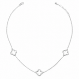 Sterling silver dipped open quatrefoil link station necklace with three elegant clover charms on an adjustable chain displayed on a white background.