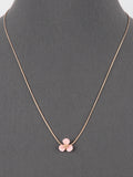 Pink enamel flower necklace on an adjustable gold-tone sliding chain